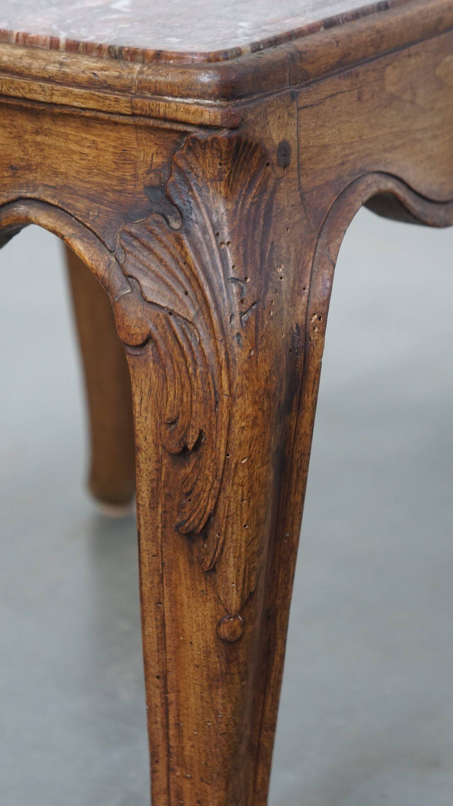 French late 18th century side table with a wooden frame and a marble top