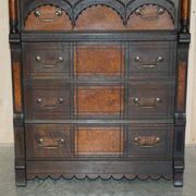 Victorian Wellington chest in figured elm by R Crosby & Son with 160 seal impressions.