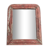 Old mirror in red wood