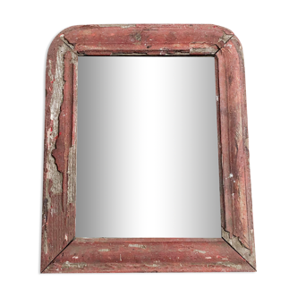 Old mirror in red wood