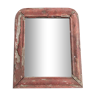 Old mirror in red wood