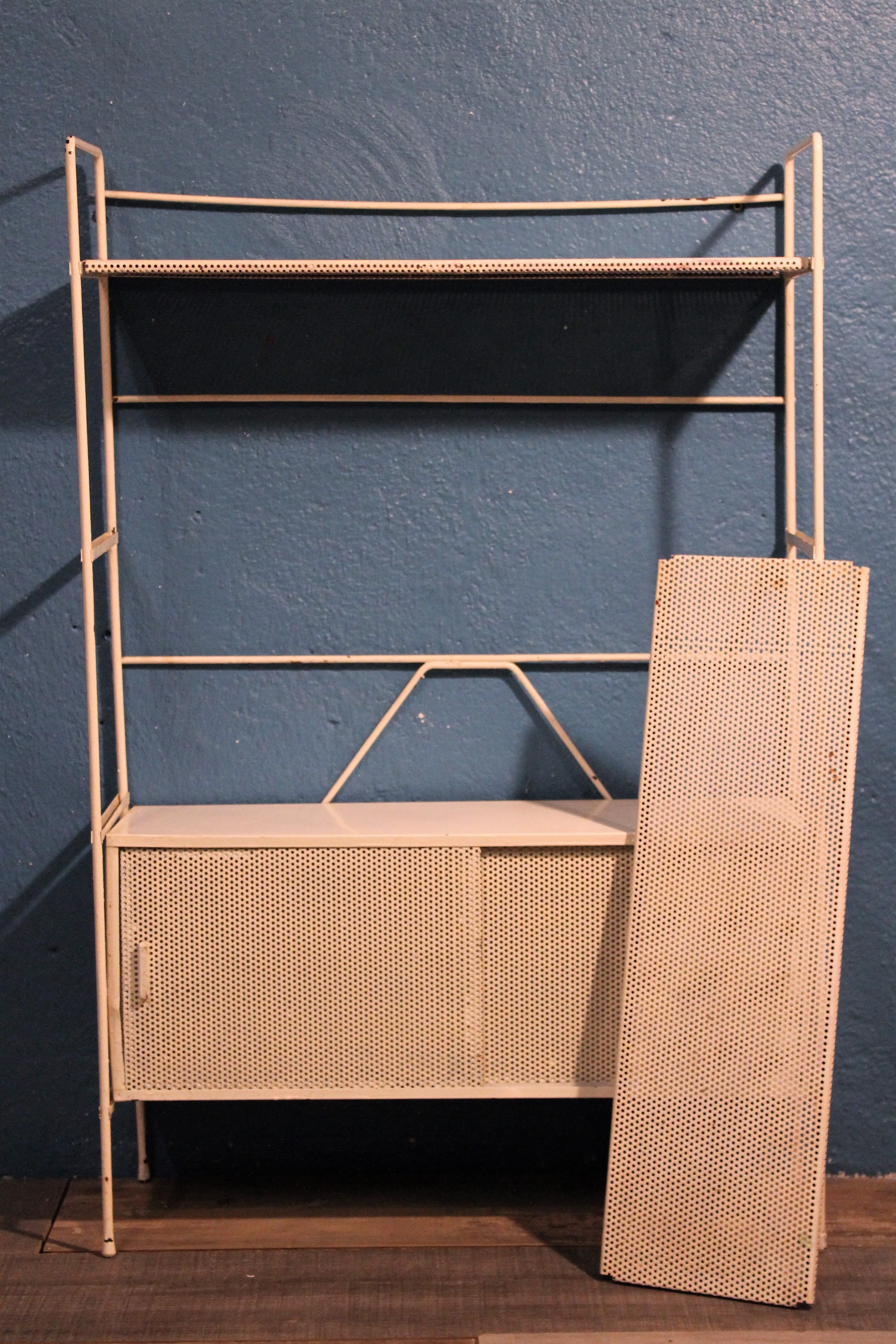 Perforated metal stand 1950
