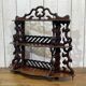Late 19th century mahogany shelf, can be placed on a surface or hung on the wall.