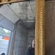 Louis XVI mirror in gilded wood, 18th century.