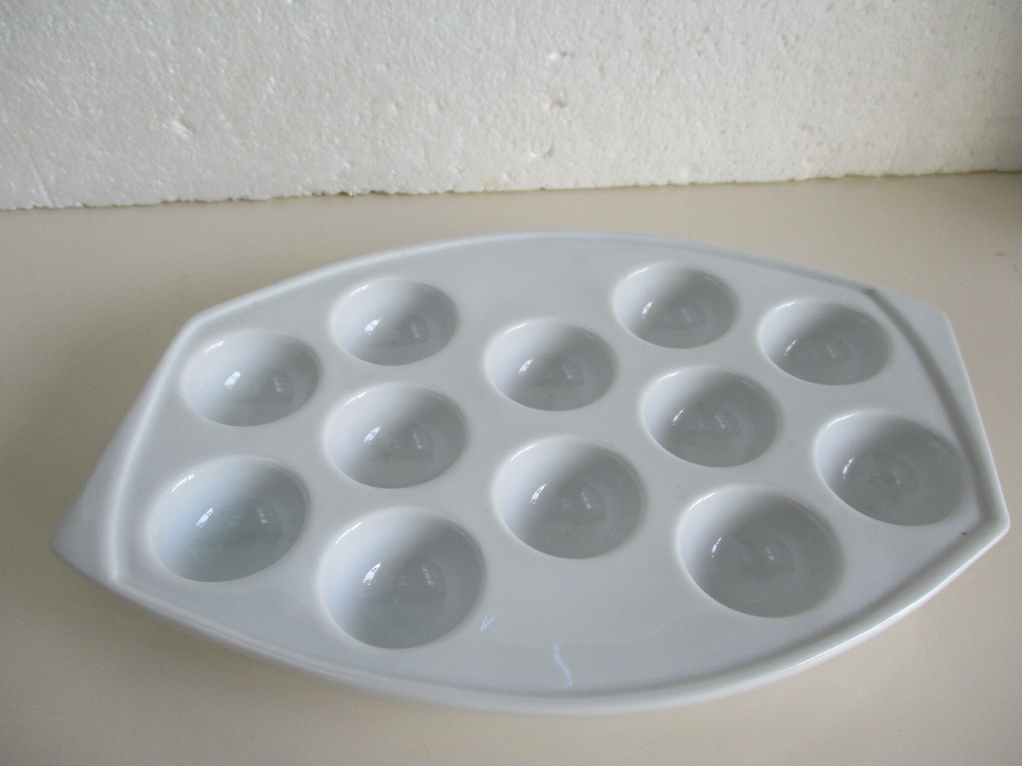 White porcelain snail dish