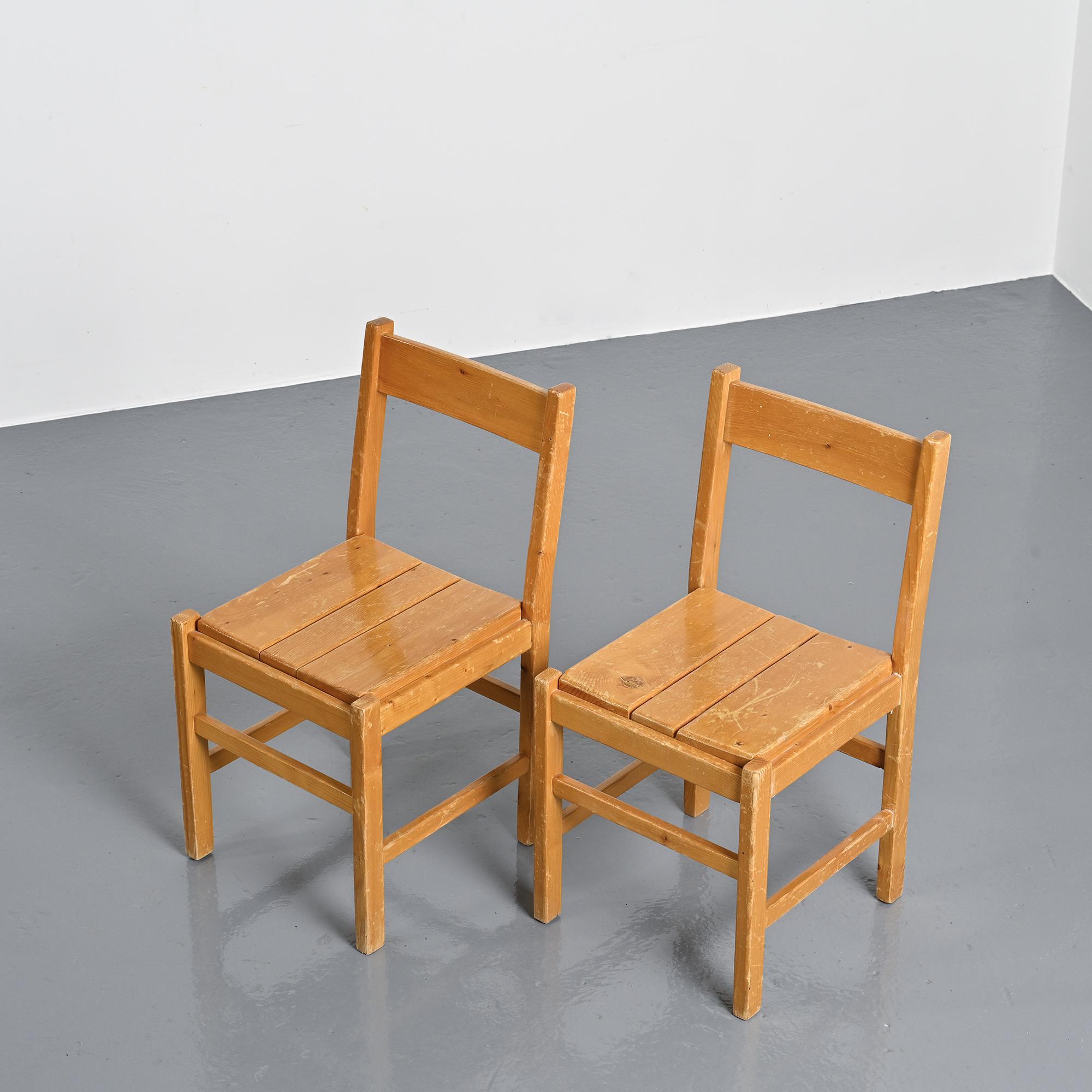 Pair of pine chairs, Maison Regain, France, circa 1970