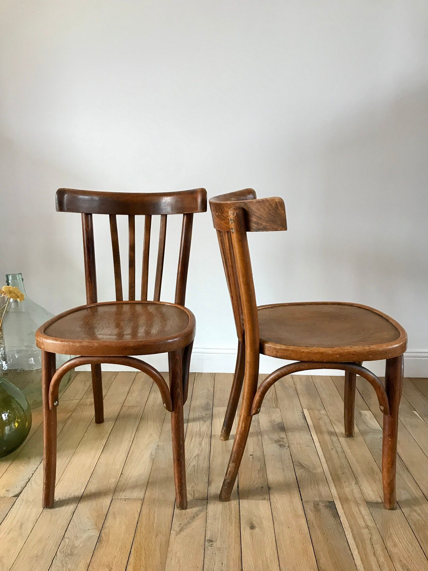 Pair of Baumann curved wood bistro chairs early twentieth century