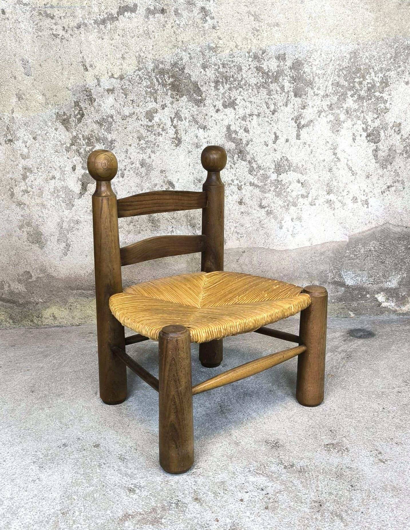 Vintage low chair in wood and straw