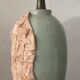 Vintage lamp base in Mactan stone and green marble.