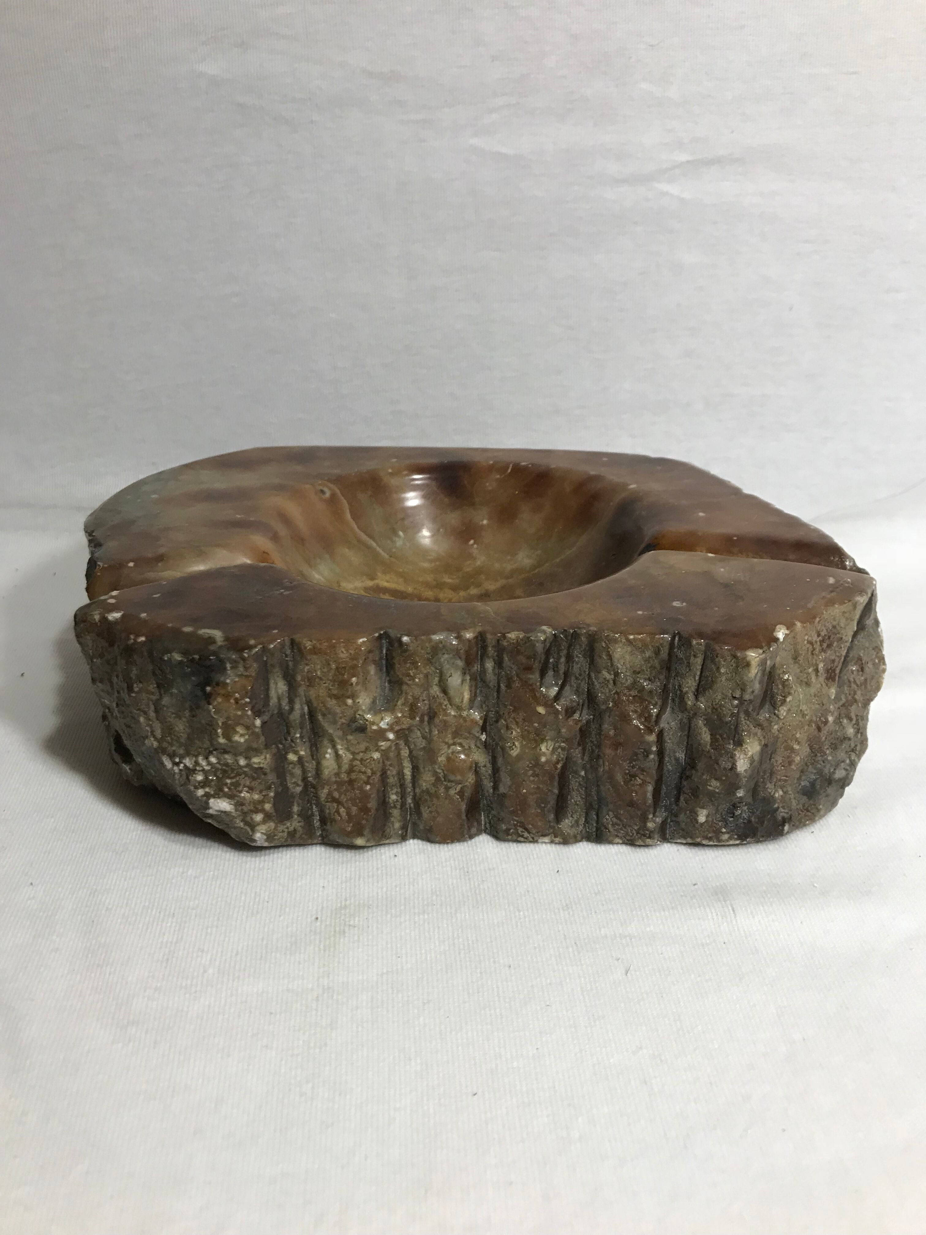 Ashtray old polished stone
