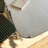 White folding metal bistro table