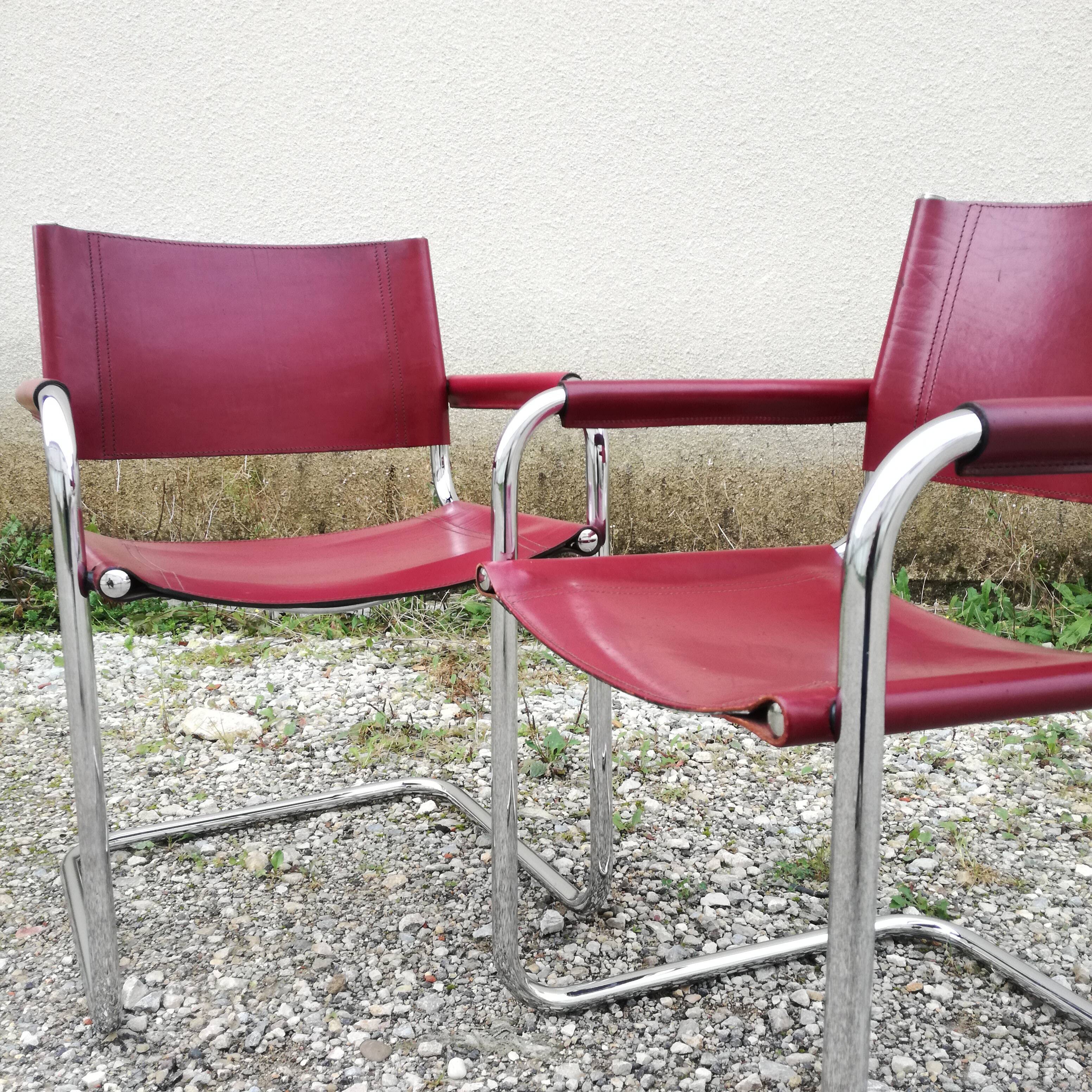 Cantilever armchair in burgundy leather and chrome