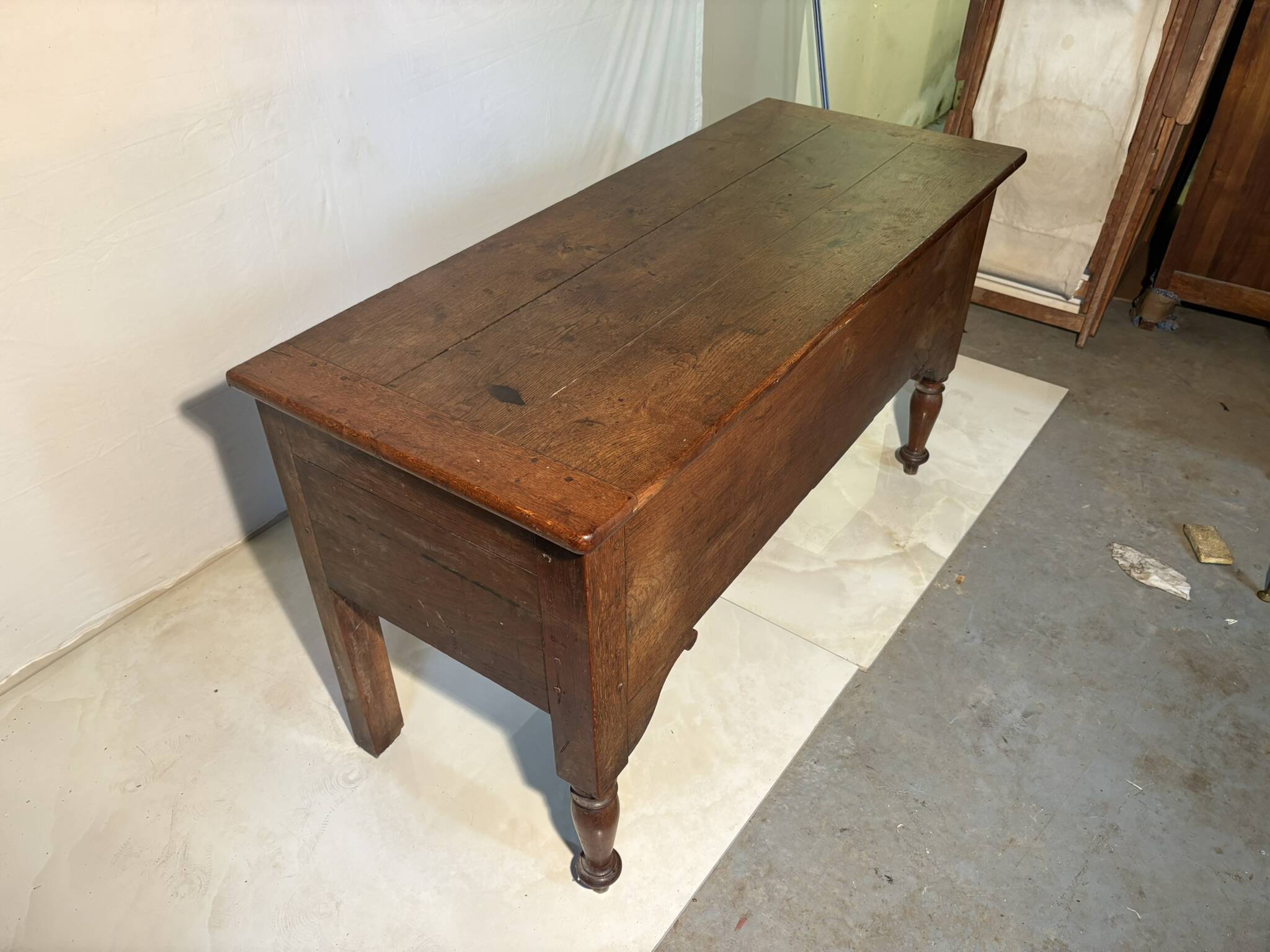 Large antique oak chest with turned legs