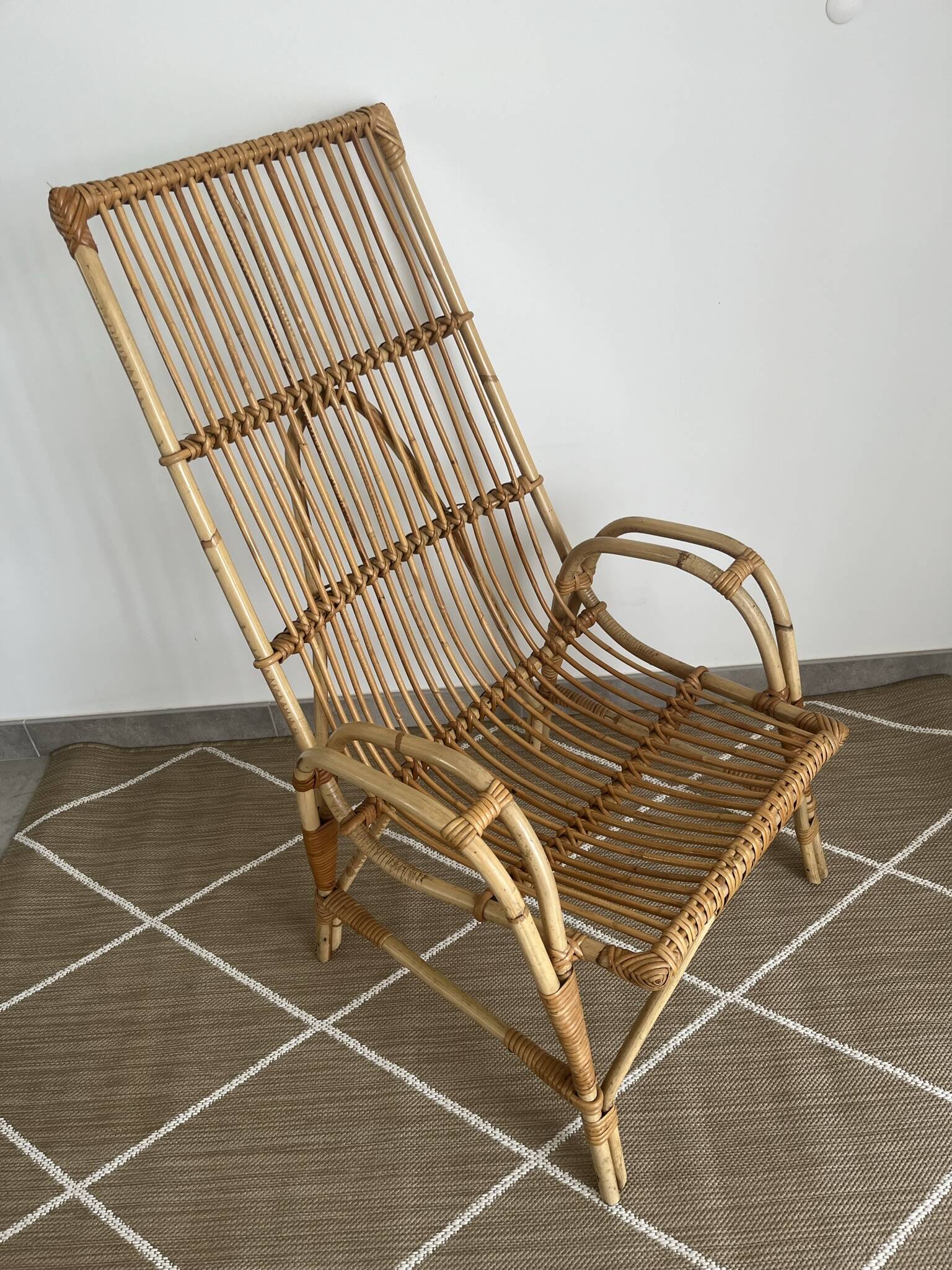 Large rattan armchair