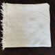 White woven cotton bedspread with fringes