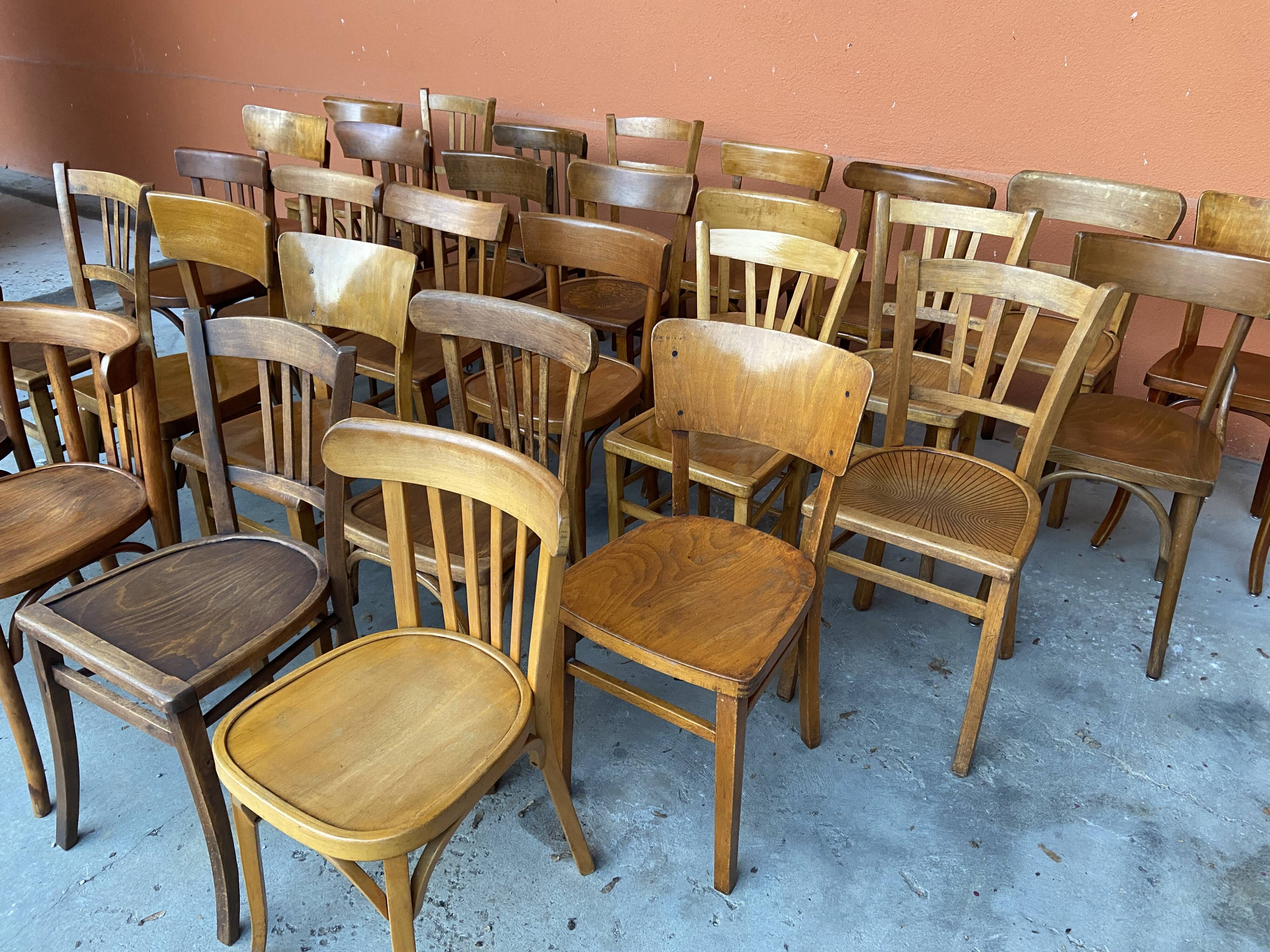 Set of 30 mismatched bistro chairs French Restaurant curved wood