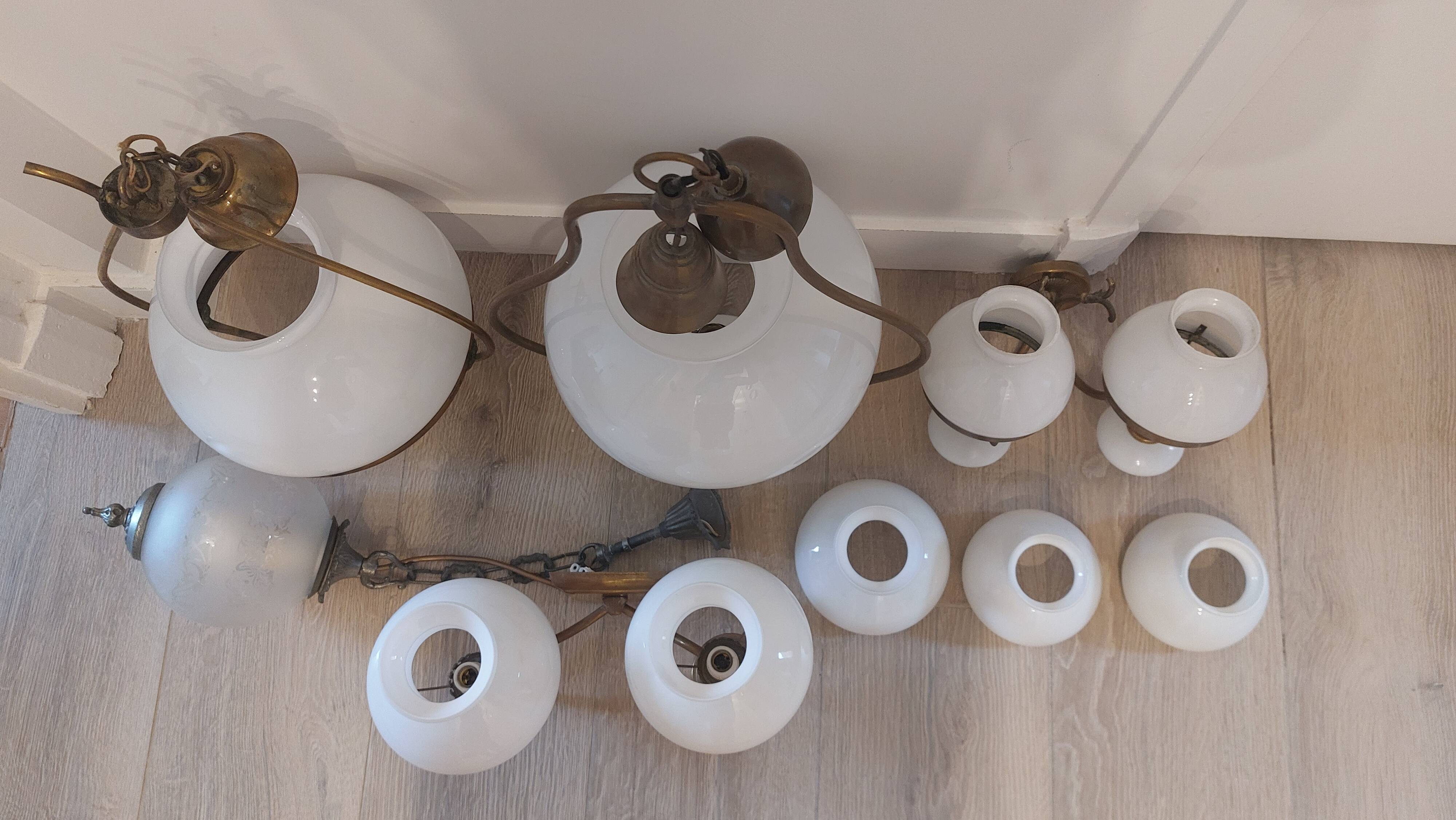 Lots of 1950s copper/ brass suspensions and wall lights with shades.