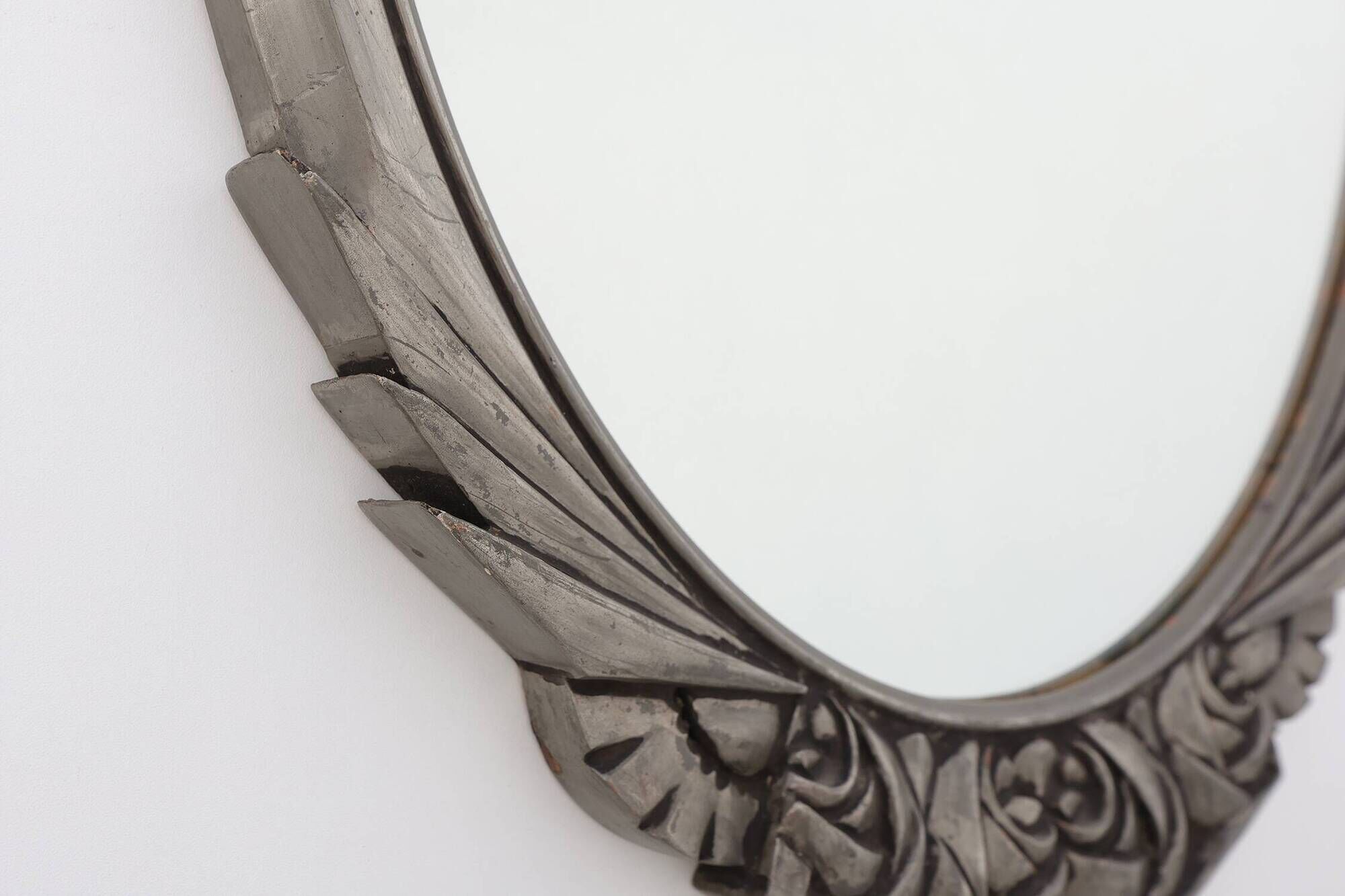 French Art Deco Oval Mirror with Carved Roses and Silver-Painted Frame