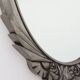 French Art Deco Oval Mirror with Carved Roses and Silver-Painted Frame