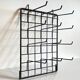 Vintage black metal wall loom display