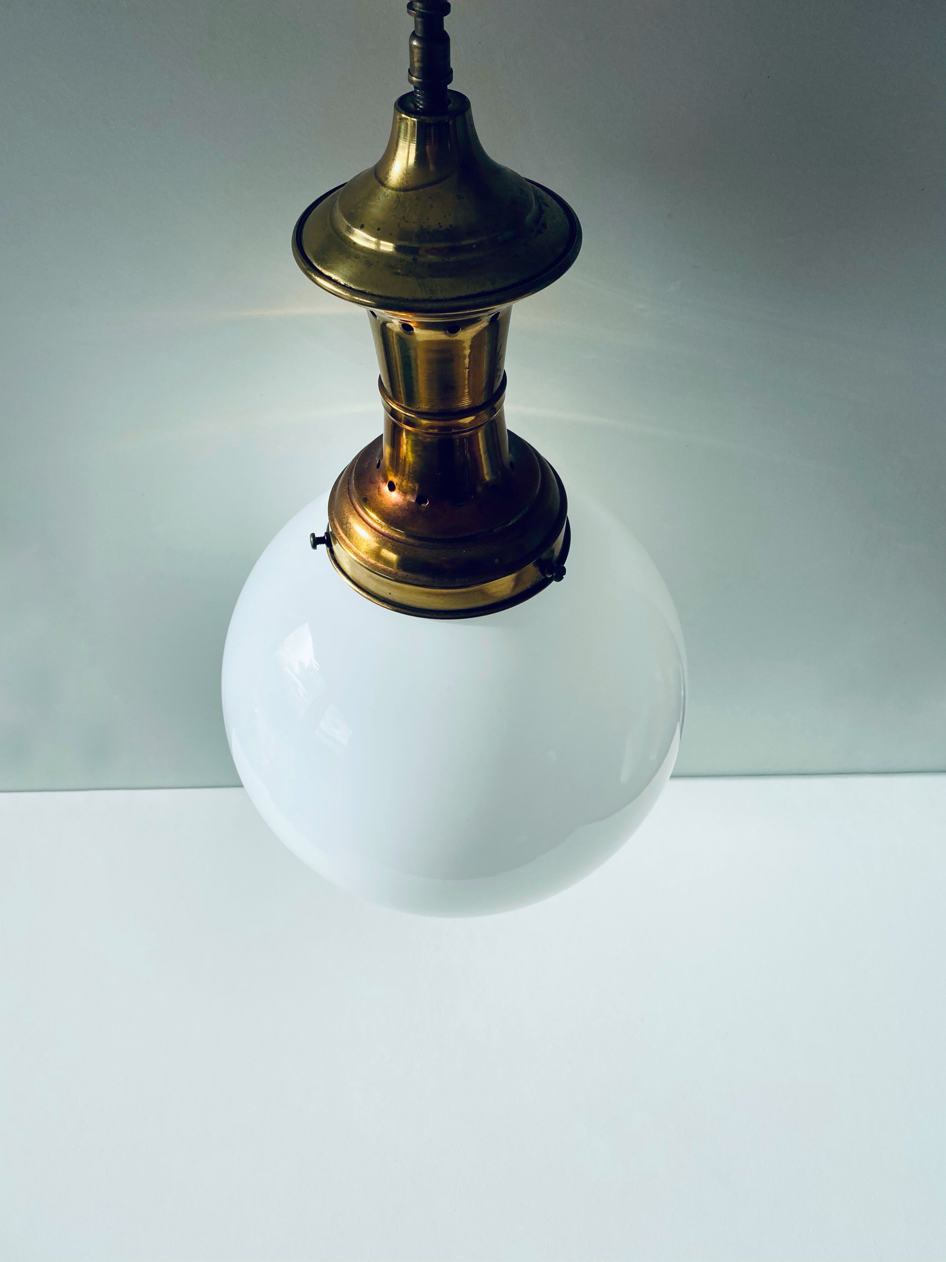 Opaline and brass globe luster