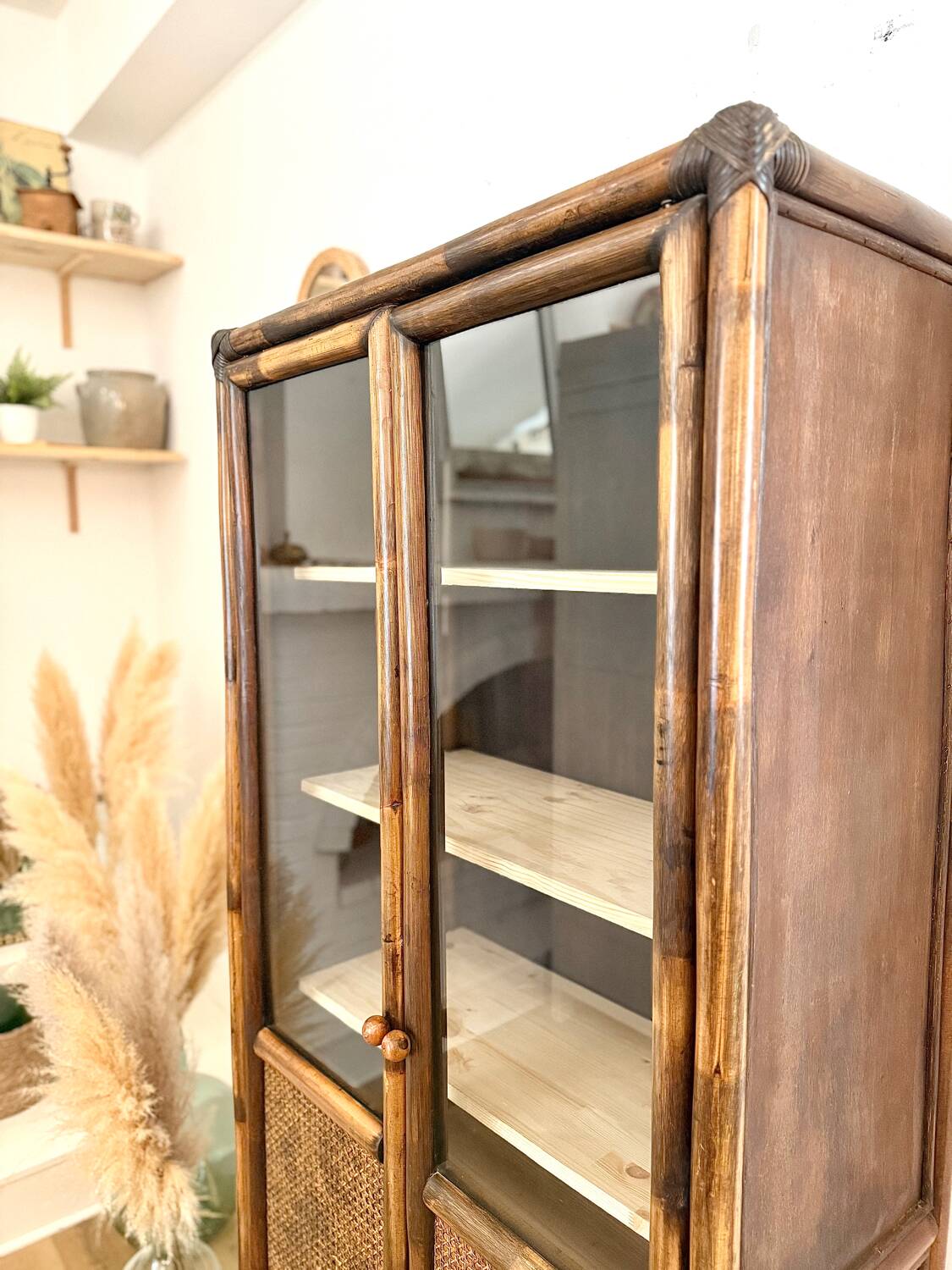 Glass cabinet in bamboo and cane