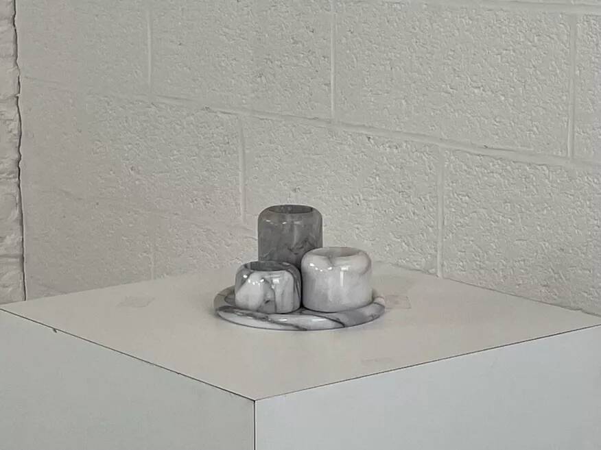 Set of marble candle holders with base