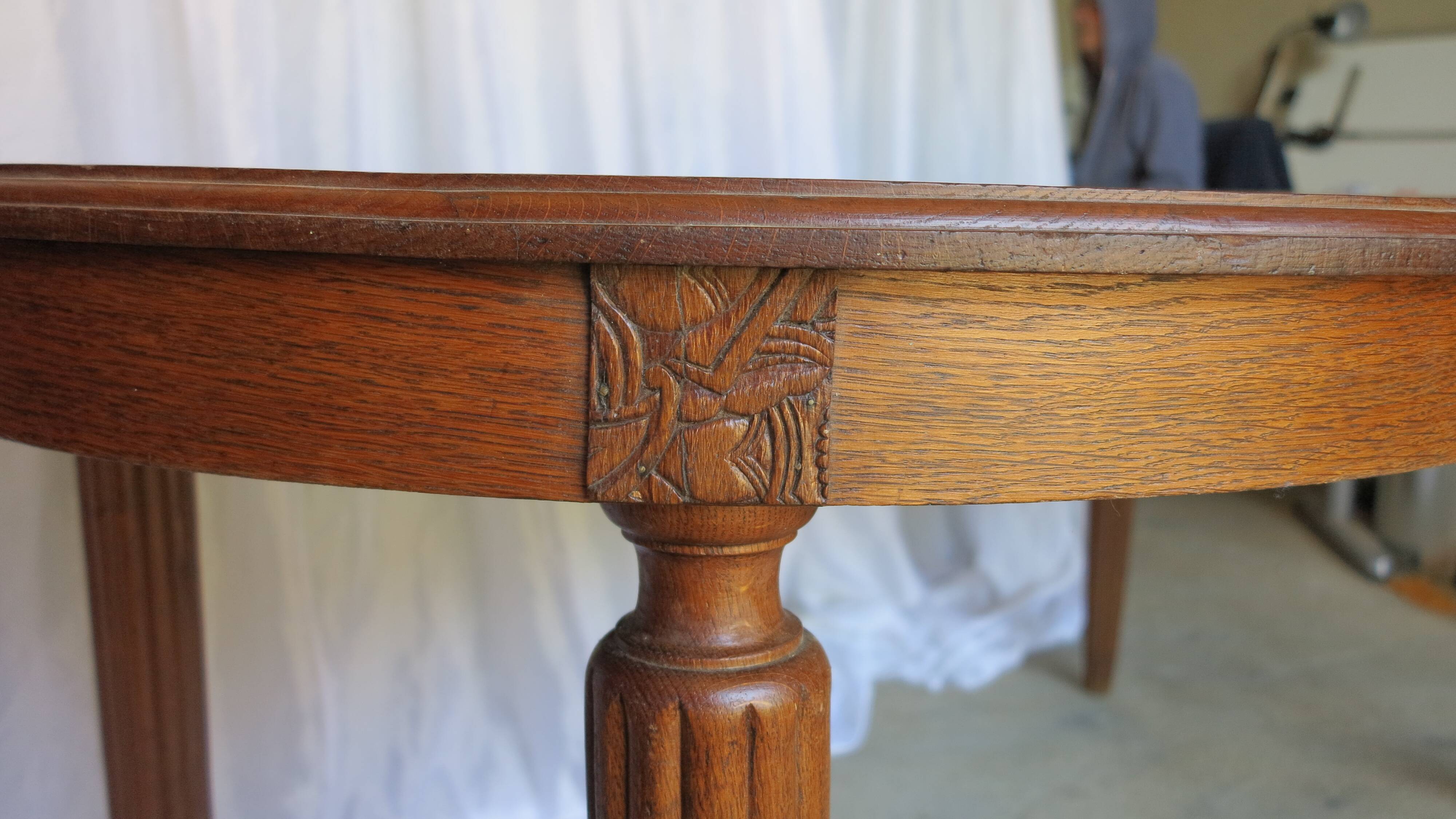 1930s oak dining table, slightly oval.