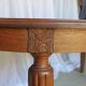 1930s oak dining table, slightly oval.
