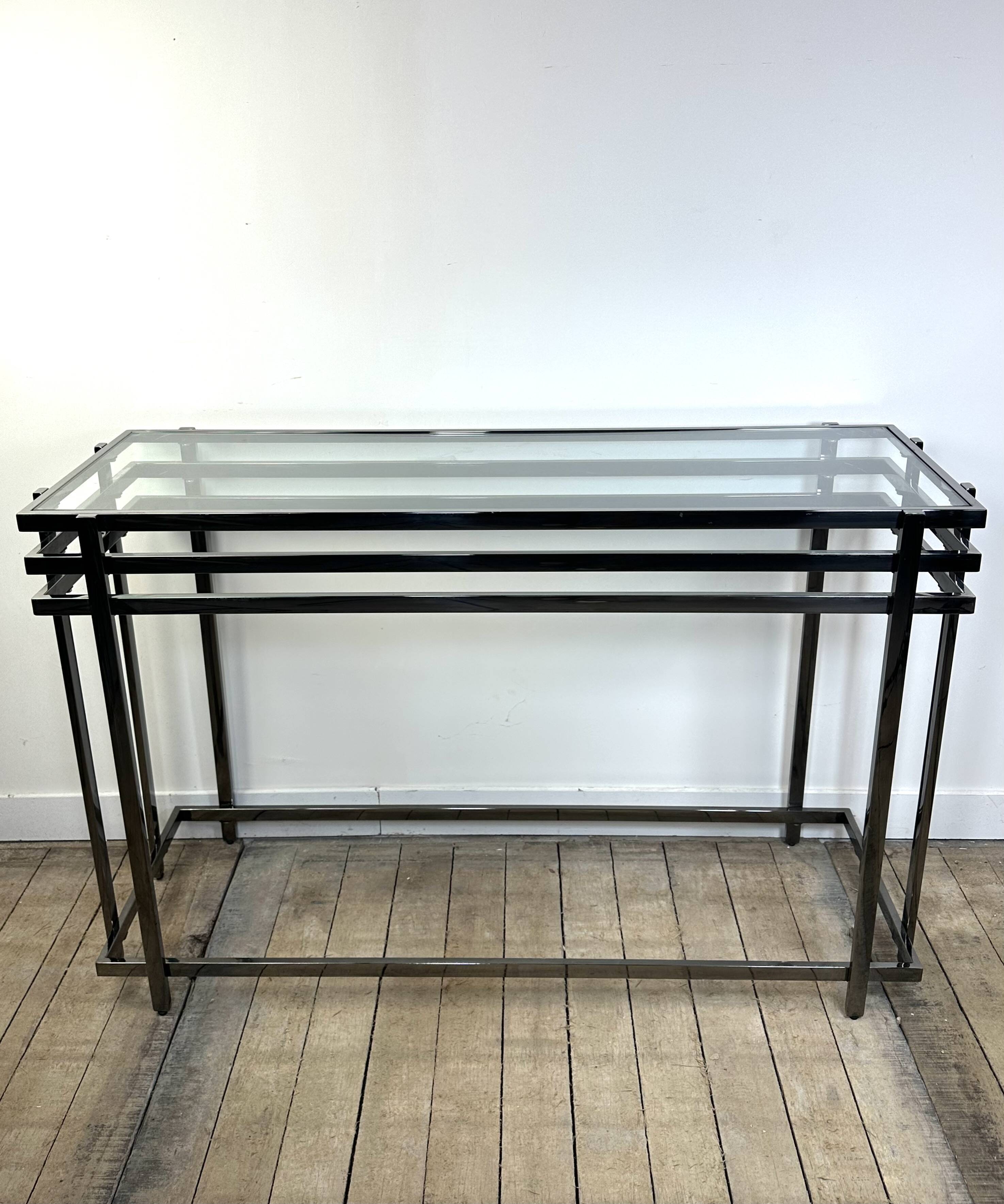 Smoked silver metal console from the 2000s.