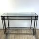 Smoked silver metal console from the 2000s.