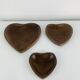 Set of 3 Scandinavian teak empty pockets in heart shape.