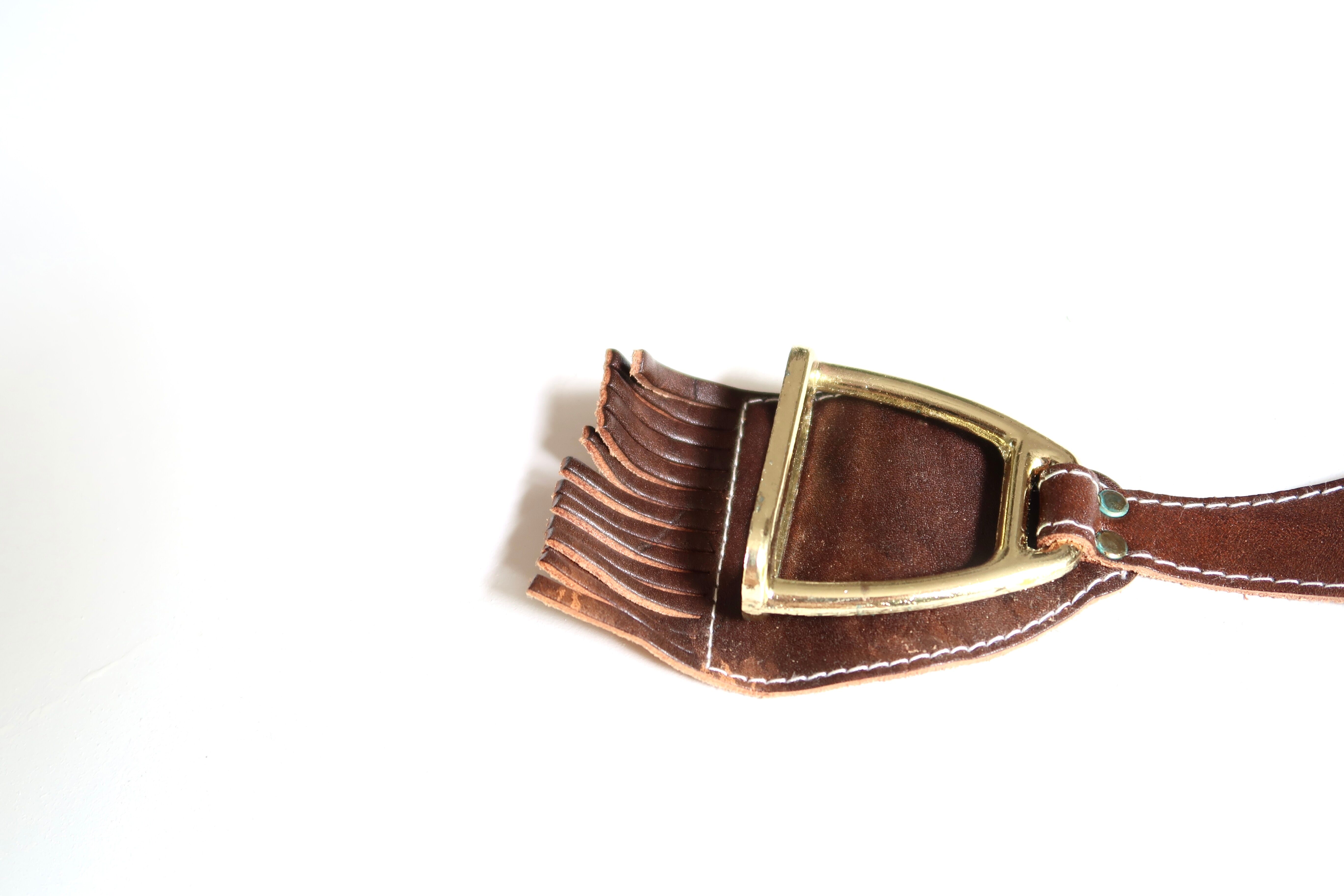 Armrest ashtray with stirrups, 50s