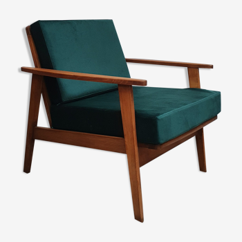 Scandinavian style armchair in forest green velvet