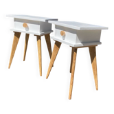 Pair of vintage bedside tables with high compass legs, top design.