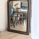 Miroir style Louis-Philippe en bois flammé noir et doré - 96 x 66 cm