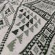 Handwoven white and green rug