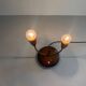 Simple double-headed table lamp in wood and brass, 1960s, Germany.