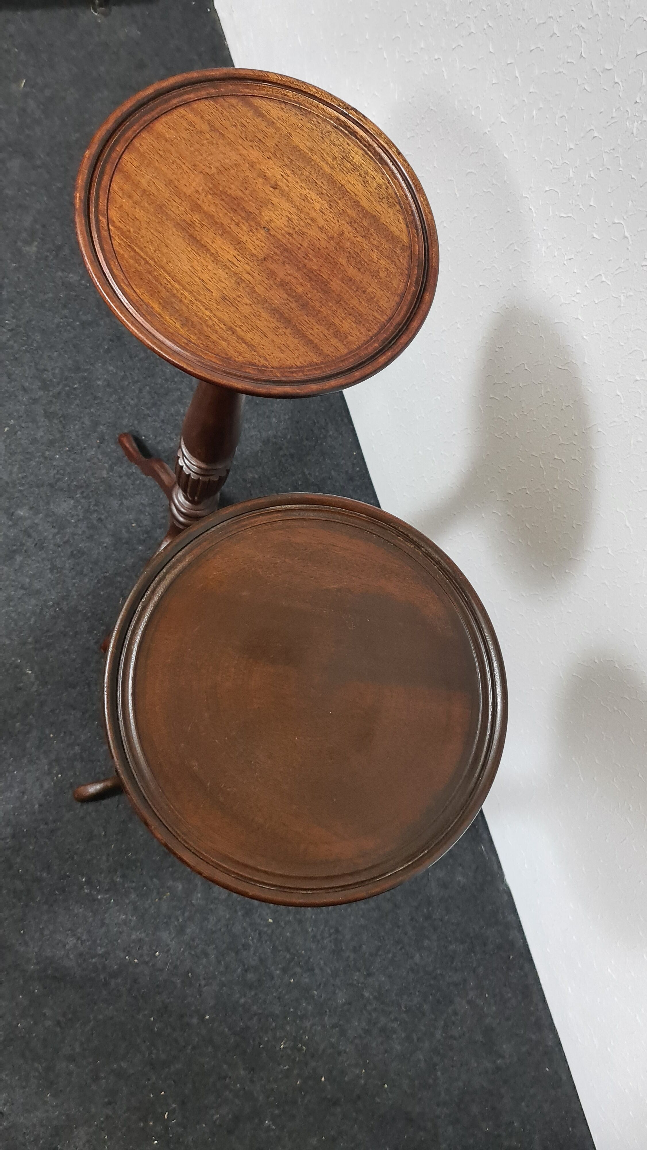 A pair of vintage flower pot stands