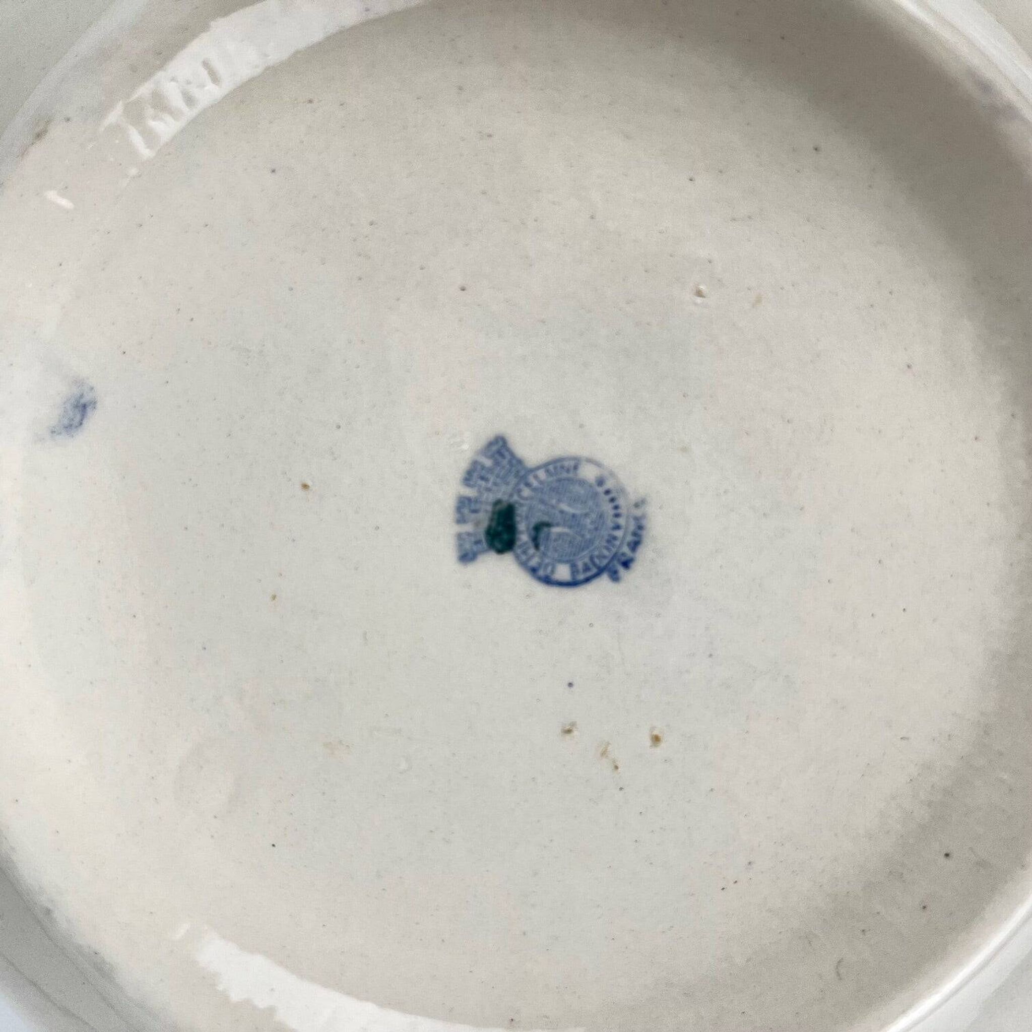 Half-porcelain salad bowl Badonviller, blue flower pattern, early 20th century.