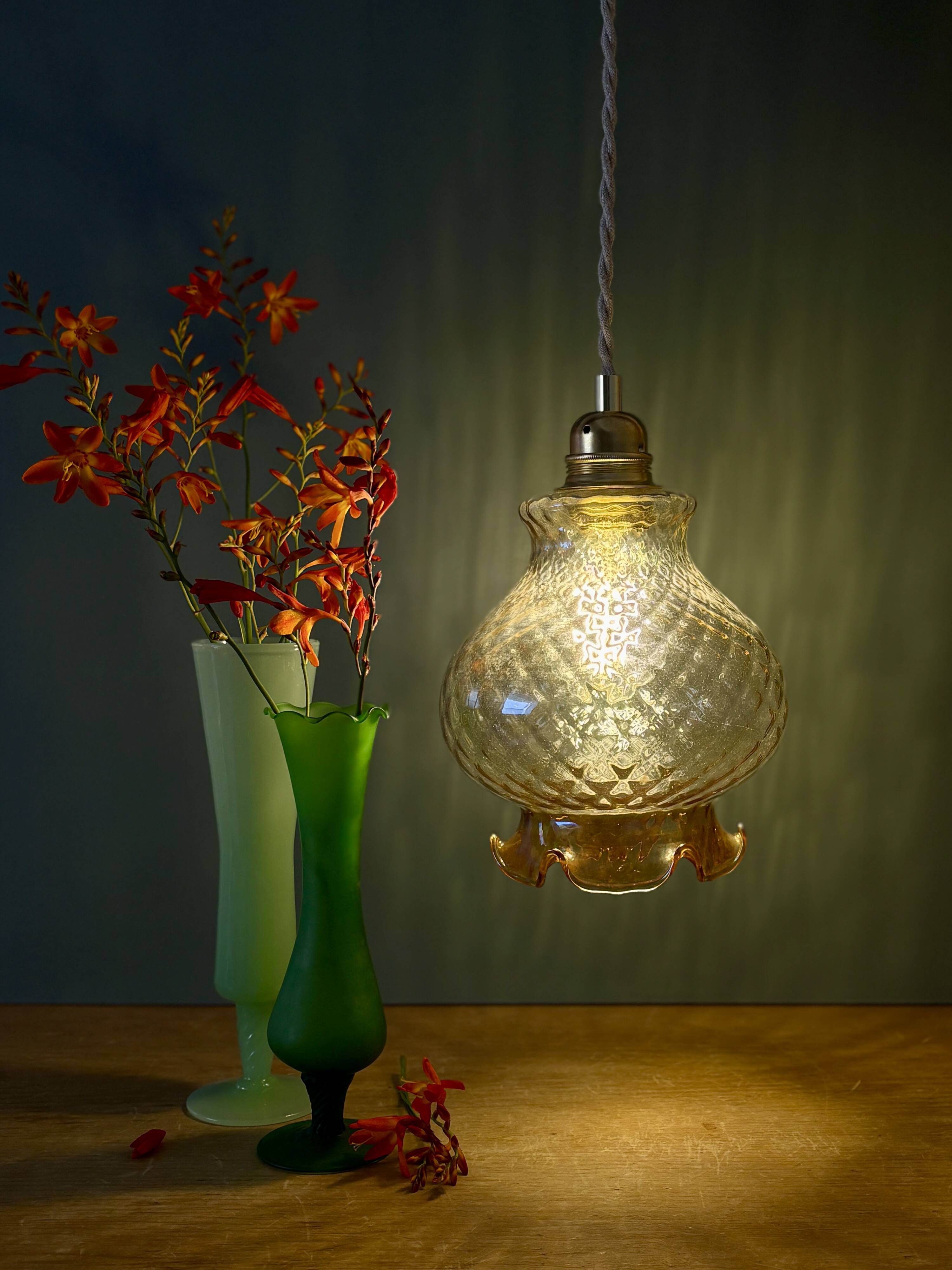 Vintage amber glass suspension globe