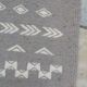 Hand-made grey and white wool rug 138x72cm