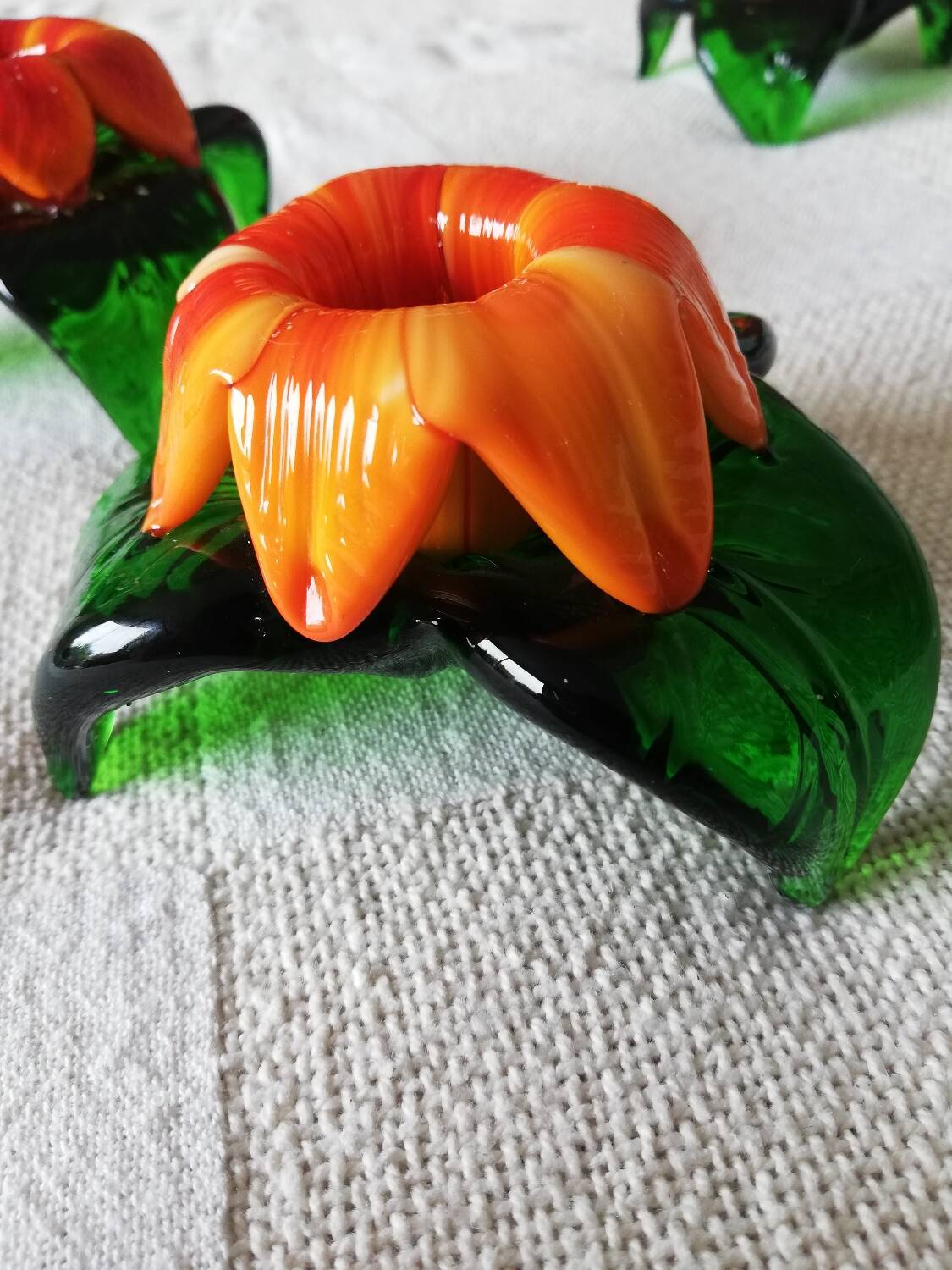 Lot of three Murano flower candle holders.