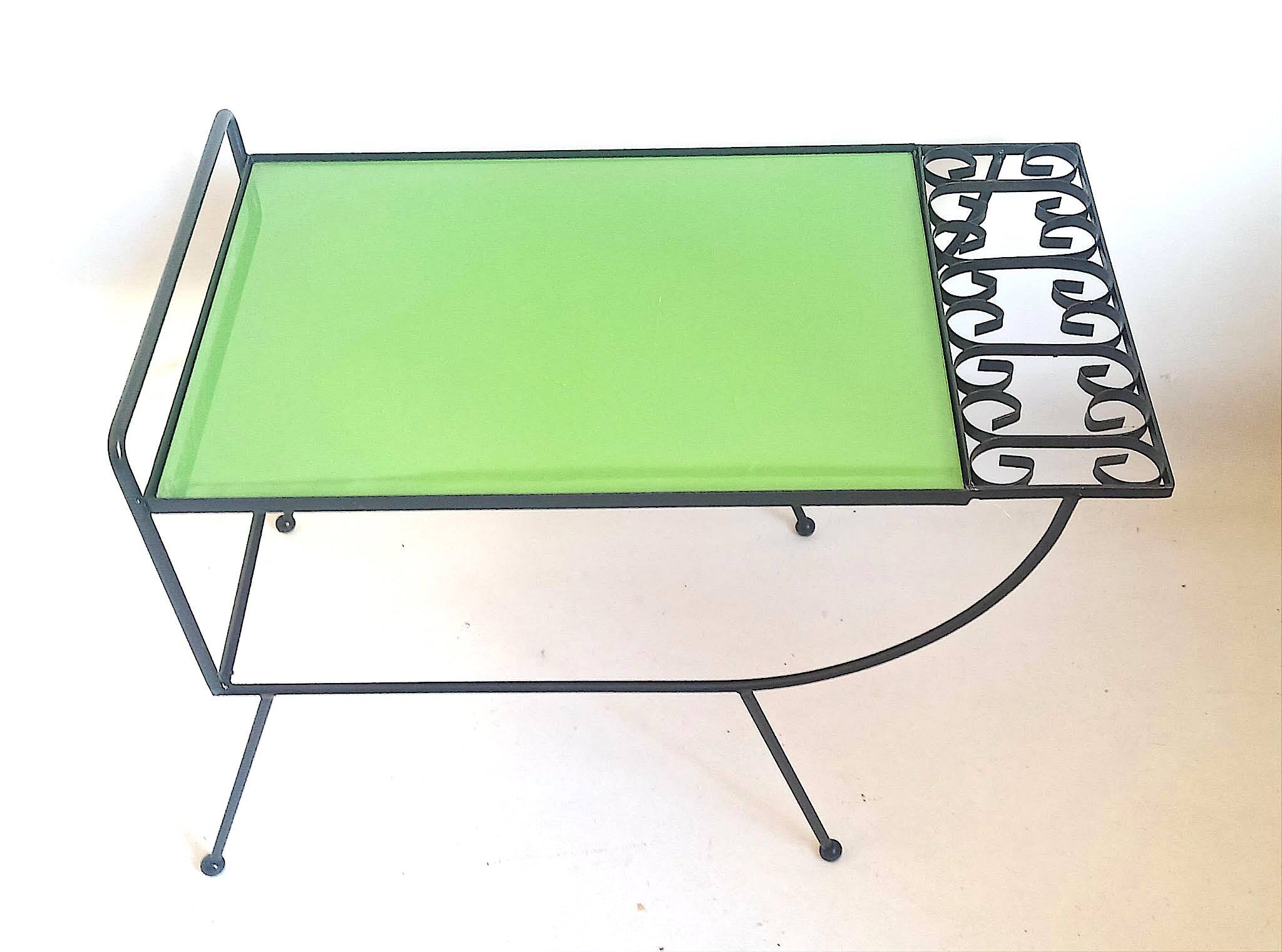 1960s side table with a lime green top, width 65.5 cm.
