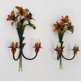 Large pair of vintage sconces in painted metal in the shape of a fleur-de-lis and foliage. 1970s