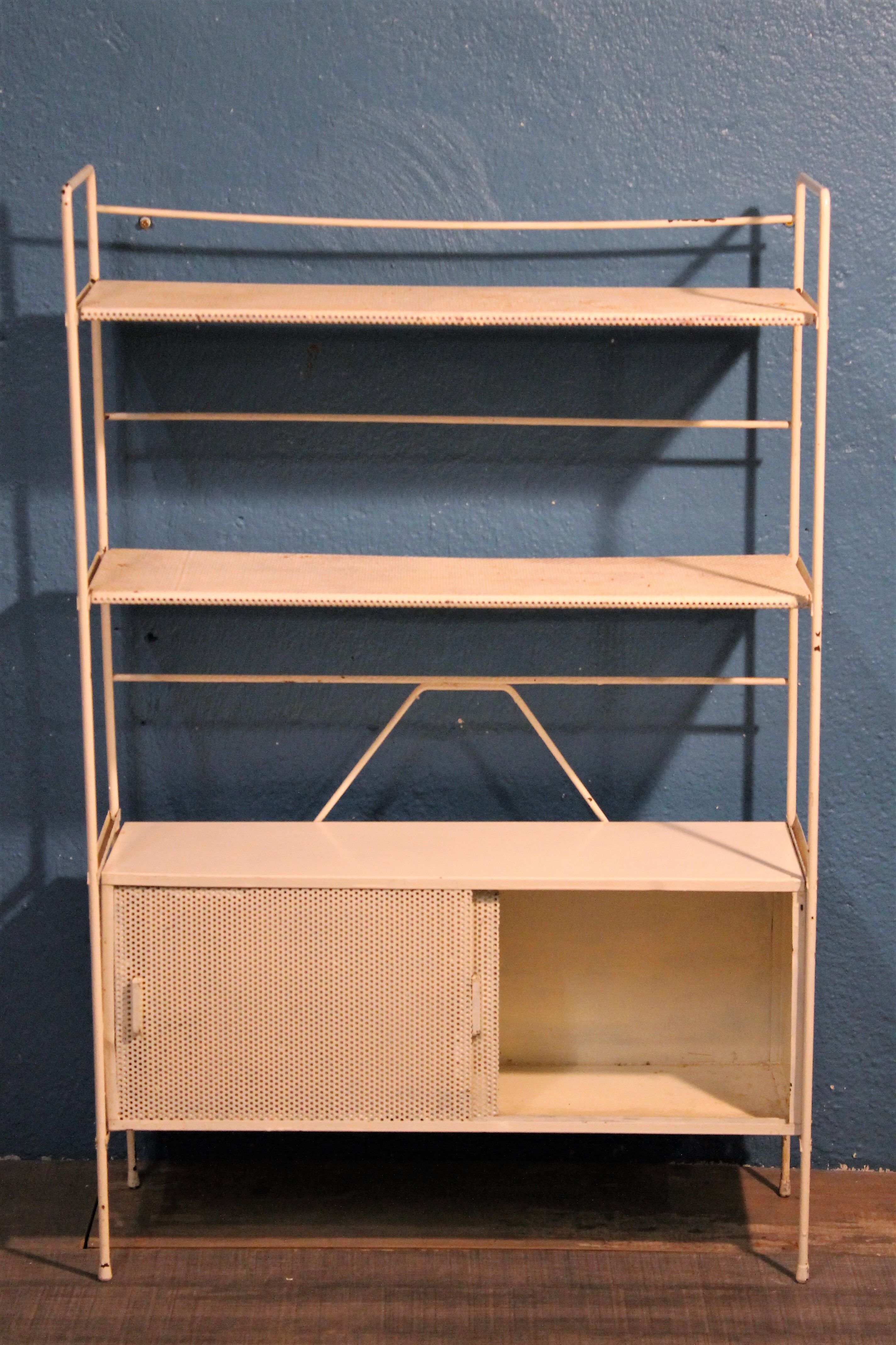 Perforated metal stand 1950