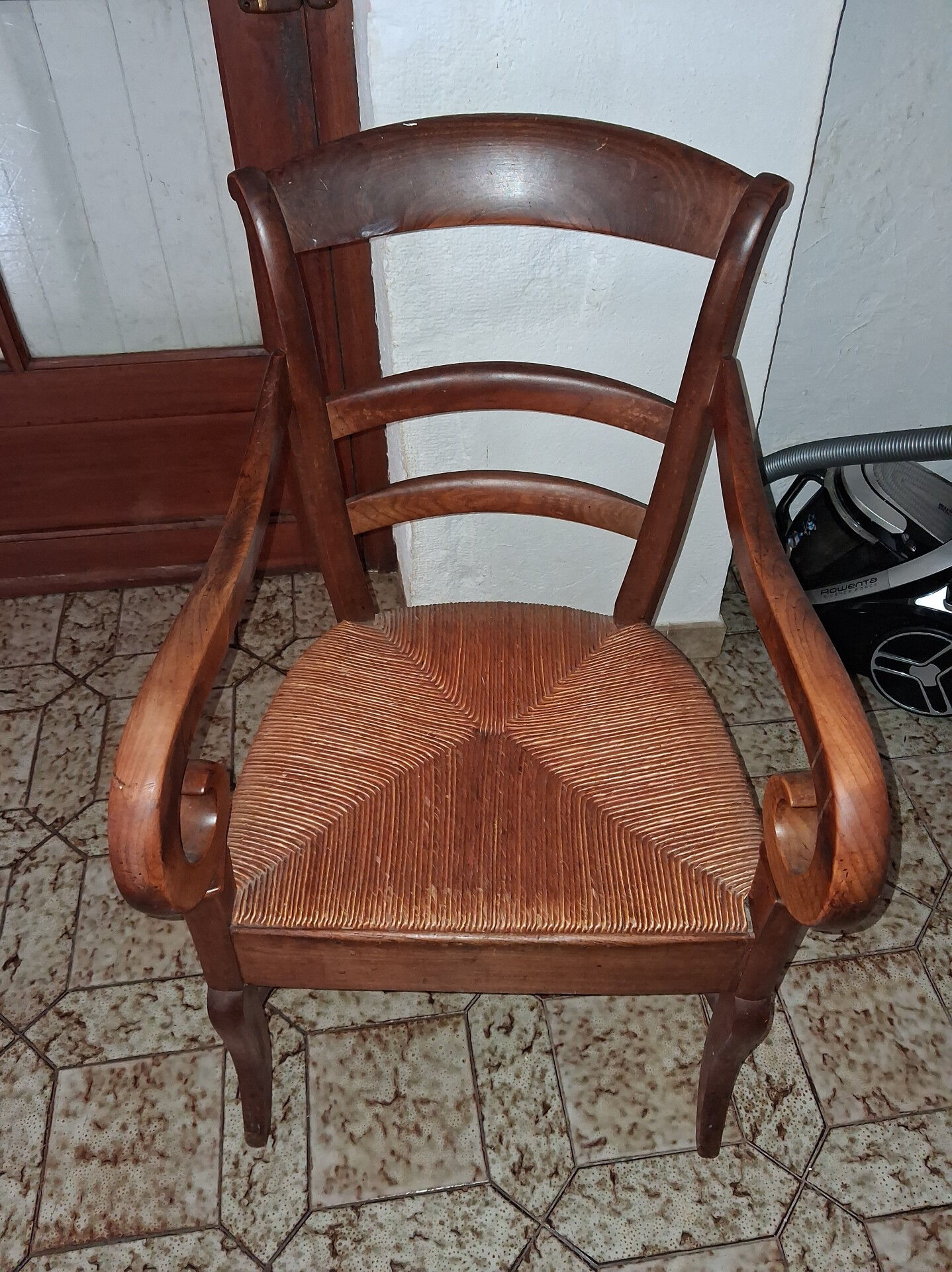 Empire armchair in solid walnut, early 19th century