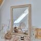 Miroir rectangle en bois et sculpté en bas-reliefs