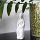 Vintage white plaster statuette of the Virgin Mary.