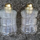 Duo of vintage molded glass globe pendant lights.